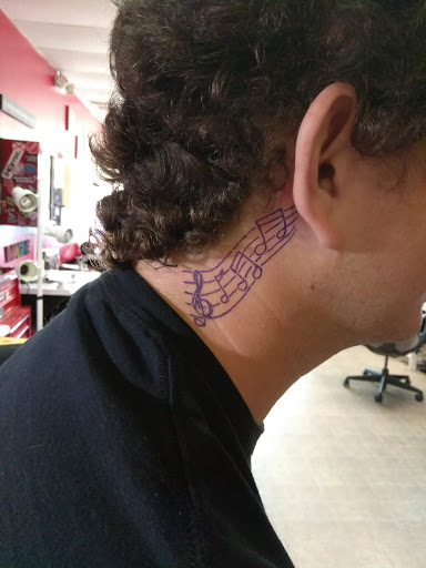 Tattoo Shop «Divine Torture», reviews and photos, 3223 Curry Ford Rd, Orlando, FL 32806, USA