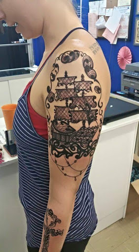 Explore mad hatter tattoo ideas, creative tattoo ideas in Owensboro, available at Lady Luck Tattoo and Body Piercing