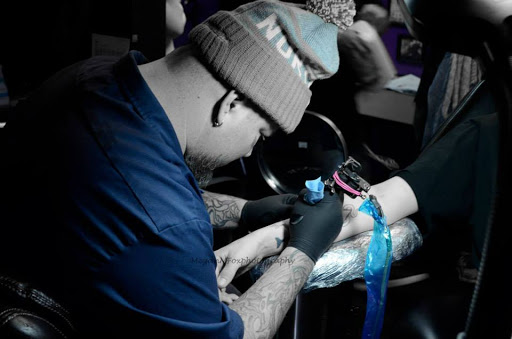 Explore inner biceps tattoo ideas, creative tattoo ideas in Minneapolis, available at Mafia Ink Tattoo Studio