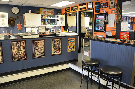 Tattoo Shop «Ageless Art Tattoo & Piercing», reviews and photos, 711 E Lewis and Clark Pkwy, Clarksville, IN 47129, USA
