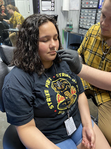 Explore red and black tattoo ideas, creative tattoo ideas in Pasadena, available at Lucky Duck Tattoo And Piercing