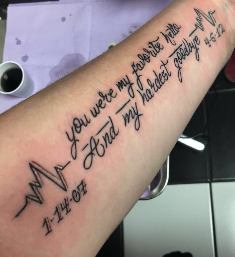 Explore ripped tattoo ideas, creative tattoo ideas in Avon, available at Altered Image Tattoo and Piercing Studio