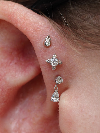 Explore gypsy hippie tattoo ideas, creative tattoo ideas in Seattle, available at Bury Me In Gold Body Piercing