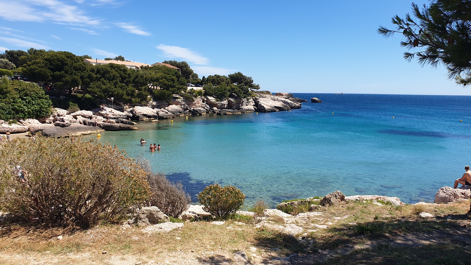 Foto di Plage de Carro con una superficie del sabbia beige