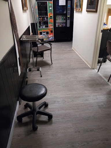 Explore tattoo chest piece ideas, creative tattoo ideas in Charleston, available at Nemesis Tattoo and Art Gallery