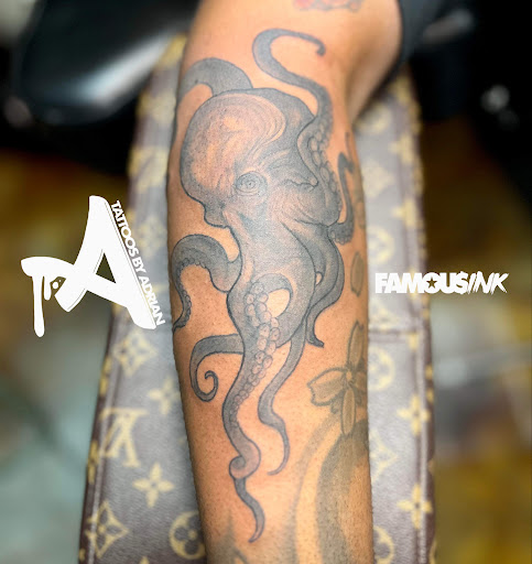 Explore stomach tattoo ideas for women, creative tattoo ideas in Hammond, available at Famous Ink, Inc.