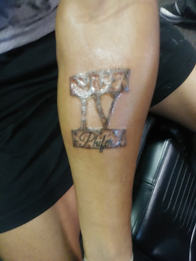 Explore hand tattoo ideas, creative tattoo ideas in High Point, available at Shooting Star Tattoo Studio