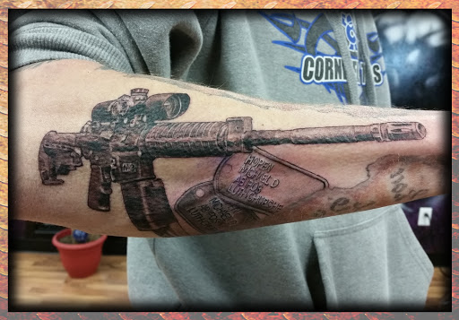 Explore cool hand tattoo ideas, creative tattoo ideas in Omaha, available at Eternal Tattoo & Body Piercing - Omaha