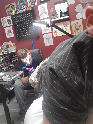 Explore tattoo ideas for men shoulder, creative tattoo ideas in Omaha, available at Eye Candy West Tattoo shop