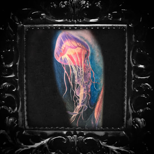 Explore matching tattoo ideas for husband and wife, creative tattoo ideas in Venice, available at The Beehive Tattoo Studio and Boutique