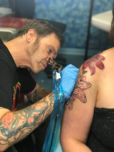 Explore small chest tattoo ideas for guys, creative tattoo ideas in Aurora, available at Ronin Tattoo Studio INC