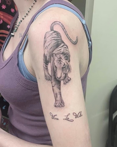 Explore punk rock tattoo ideas, creative tattoo ideas in Buffalo, available at Vagabond Ink Tattoo Parlor