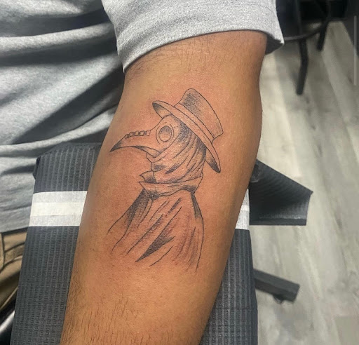 Explore forearm tattoo idea, creative tattoo ideas in Peoria, available at Modern Ink Tattoo