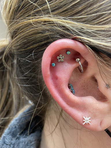 Explore frozen tattoo ideas, creative tattoo ideas in Waukesha, available at Piercing by Kelly - Waukesha Piercing