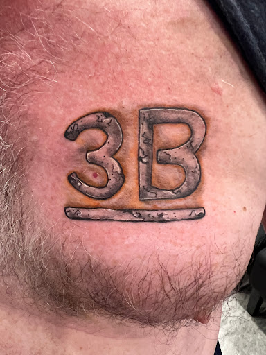 Explore ghost band tattoo ideas, creative tattoo ideas in Port Aransas, available at Island Ink studio