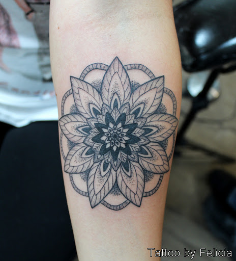 Explore small book tattoo ideas, creative tattoo ideas in Fort Myers, available at Tiger Lotus Tattoo and Piercing