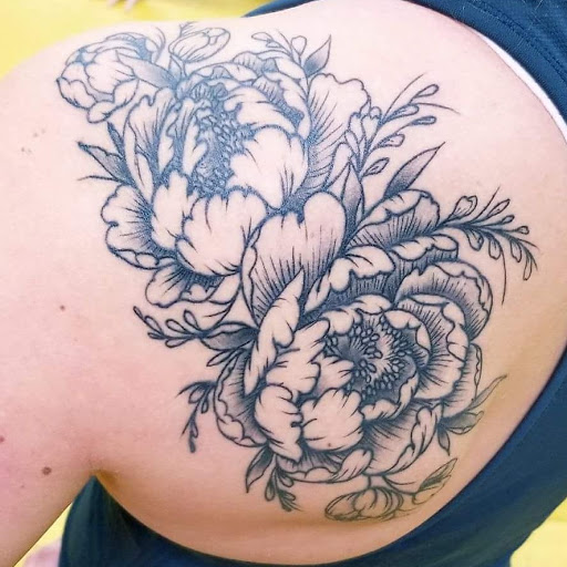 Explore women's hand tattoo ideas, creative tattoo ideas in Fort Collins, available at Parabrahma Tattoo Collective