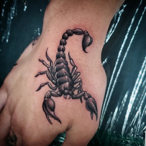 Explore scroll tattoo ideas, creative tattoo ideas in Coral Springs, available at Salvation Tattoo Lounge Coral Springs