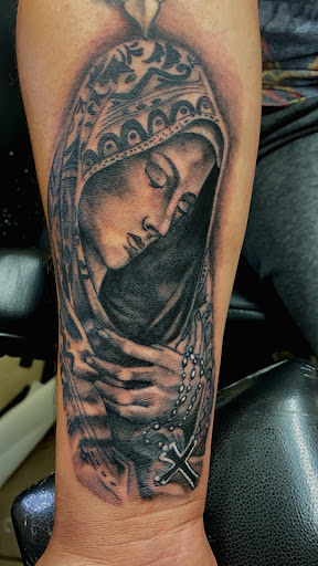 Explore mimi tattoo ideas, creative tattoo ideas in Rogers, available at Ink Solutions Tattoo