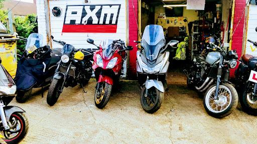 AXM Group Motorcycles, Scooters & Automotive Garage