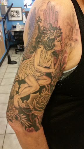 Explore flash tattoo ideas for guys, creative tattoo ideas in Utica, available at Big Top Tattoo