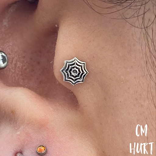 Explore facial tattoo ideas, creative tattoo ideas in Garden Grove, available at CM Hurt Piercing & Jewelry