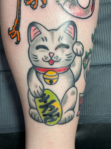 Explore minimalist dog tattoo ideas, creative tattoo ideas in Orange Park, available at Big City Tattoo and Piercing