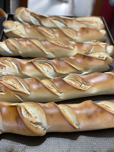 Pão quente pizzaria Bitocas - Marina Isabel Oliveira Carvalho