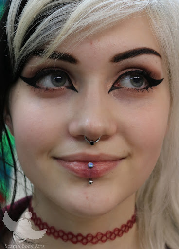 Explore 2006 tattoo ideas, creative tattoo ideas in Syracuse, available at Scarab Body Arts