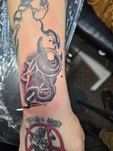 Explore pisces symbol tattoo ideas, creative tattoo ideas in Angola, available at Hoodlum Ink