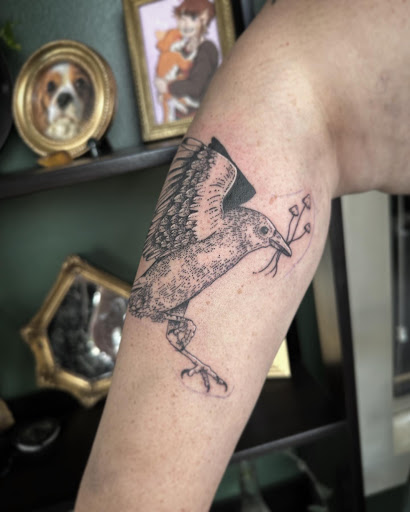 Explore tattoo ideas for a son's name, creative tattoo ideas in Westland, available at Stray Dogs Tattoo Studio