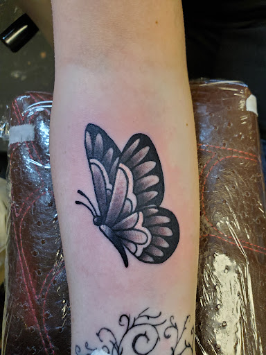 Explore number 9 tattoo ideas, creative tattoo ideas in Newport, available at Mutiny Tattoo Co. LLC