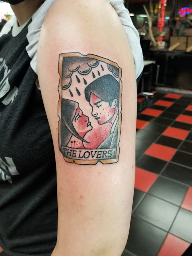 Explore lion and the lamb tattoo ideas, creative tattoo ideas in Milwaukee, available at Atomic Tattoos