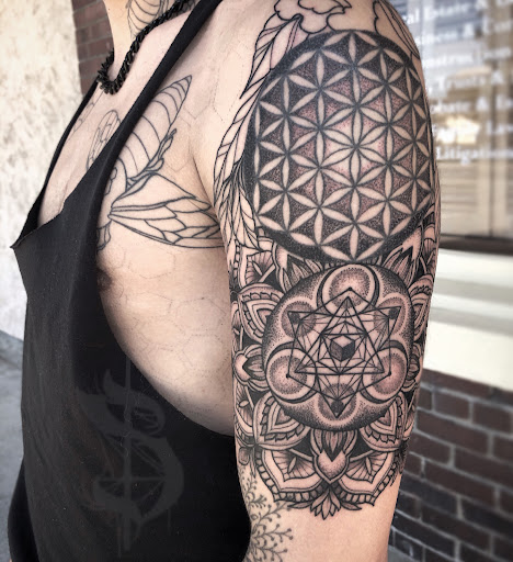 Find small cat tattoo ideas for your next unique tattoo in Lopez Island at Soot and Bone Body Art Studio