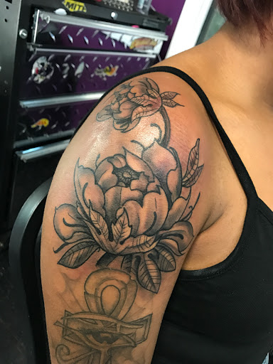 Explore king and queen tattoo ideas, creative tattoo ideas in Westland, available at Skin Sinn tattoos