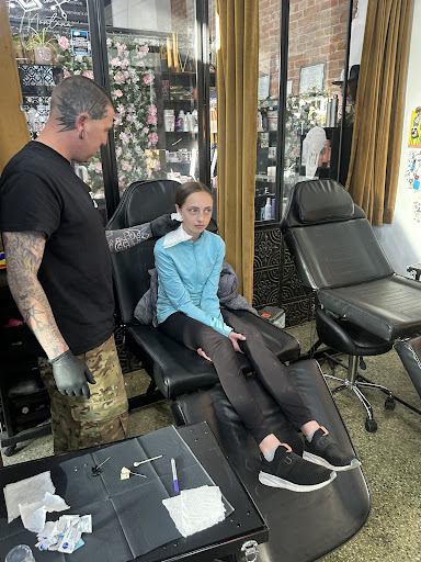 Explore cover up tattoo ideas female leg, creative tattoo ideas in Belgrade, available at The Loyal Sparrow Tattoo and Piercing