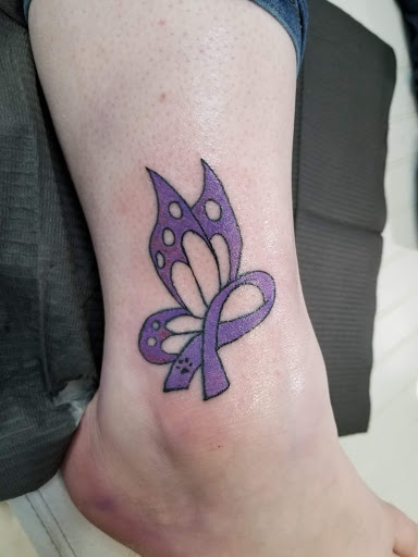 Explore tattoo ideas female, creative tattoo ideas in Flint, available at Millennial Ink- Tattoo Shop-Custom Tattoos-Top Tattoo Artist