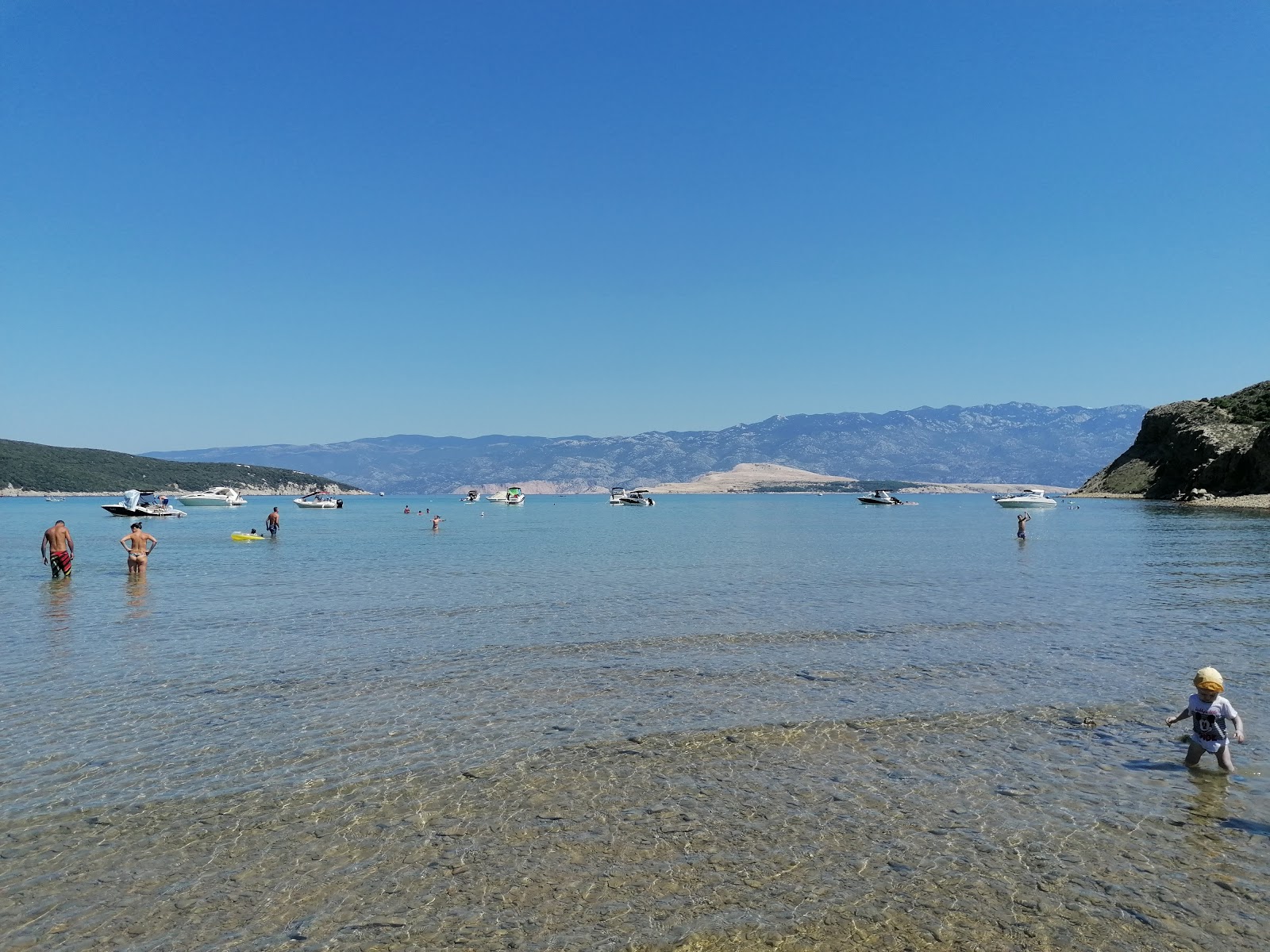Fotografie cu Podsilo beach cu o suprafață de nisip beige