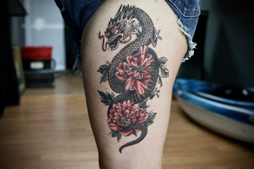 Explore m&m tattoo ideas, creative tattoo ideas in Sevierville, available at Hudsons House Of Ink