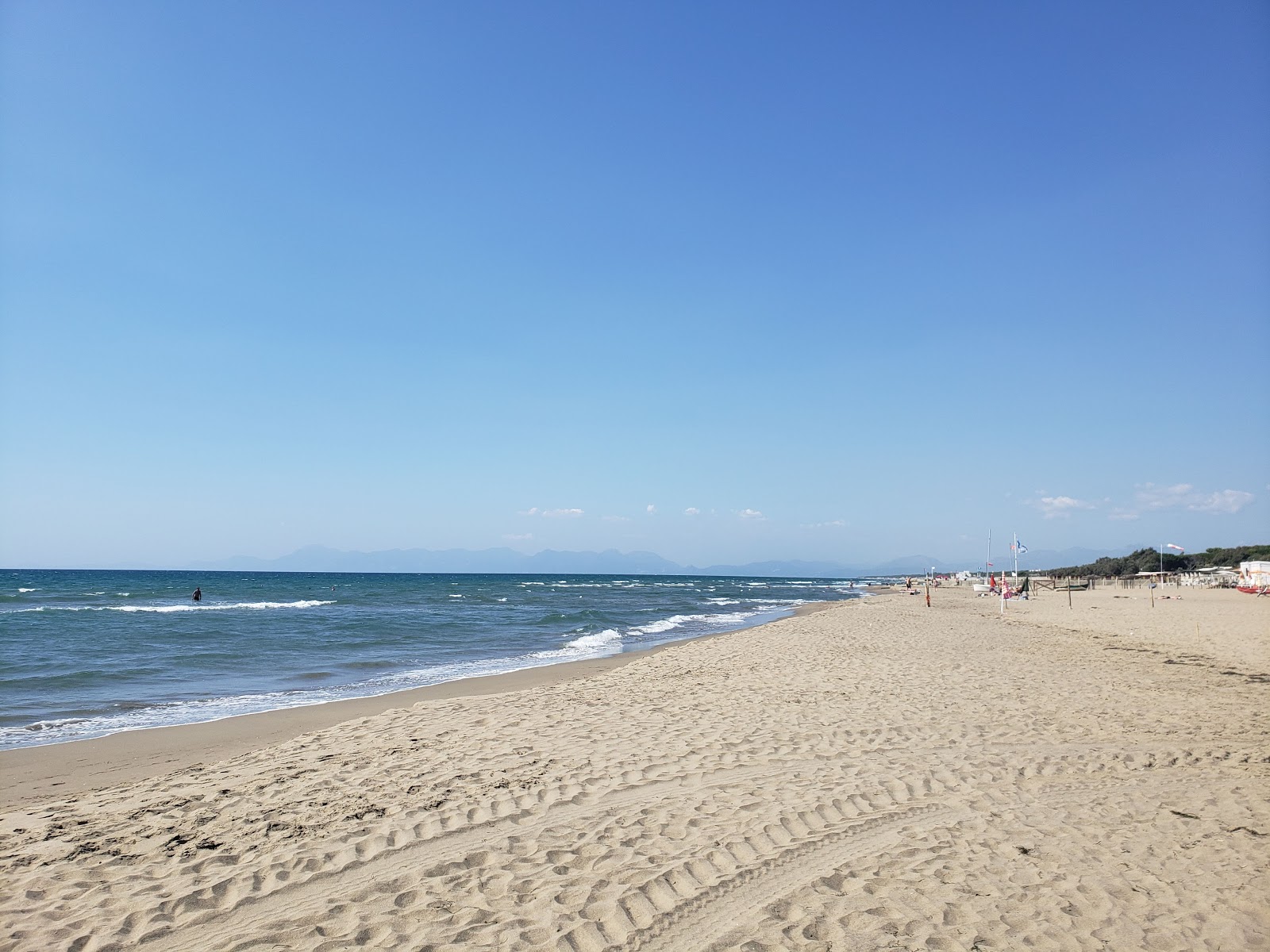 Photo of Paestum beach II with brown sand surface