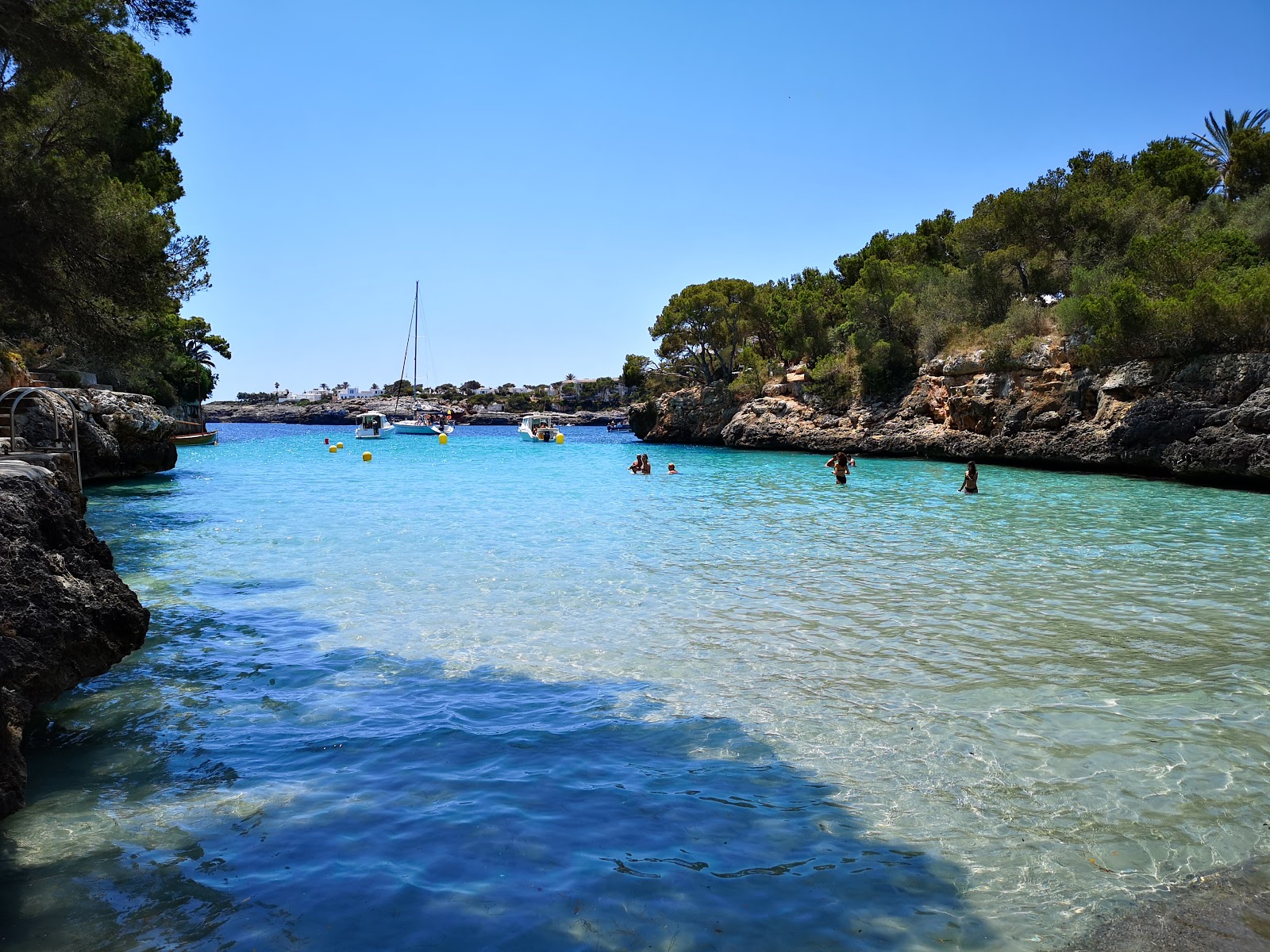 Photo of Playa de Cala Serena with turquoise pure water surface