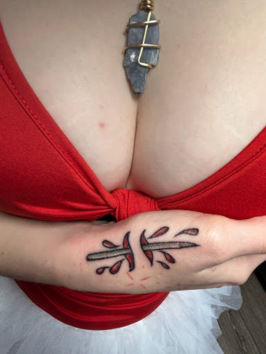 Explore rain tattoo ideas, creative tattoo ideas in Las Vegas, available at Work of Art Tattoo and Piercing