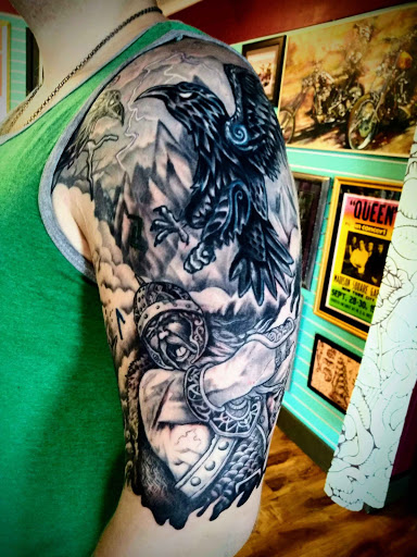Find tattoo ideas for breast for your next unique tattoo in Minocqua at Family Tradition Tattoo Co.