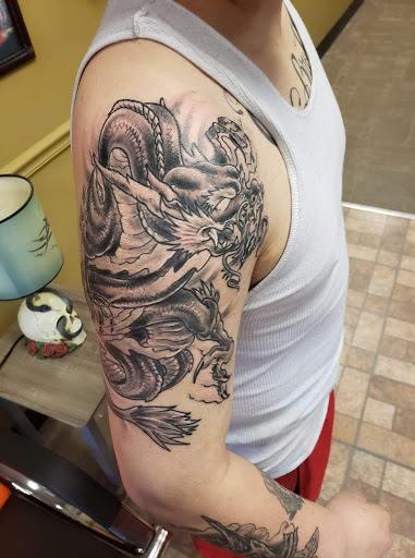 Find moth tattoo ideas for your next unique tattoo in Storm Lake at Alley Cat Tattoo