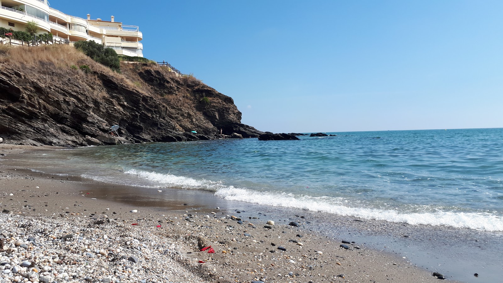 Fotografie cu Playa de la Viborilla cu o suprafață de apă pură albastră