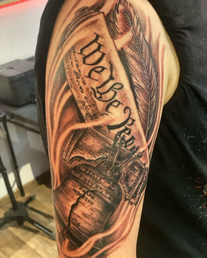 Explore music inspired tattoo ideas, creative tattoo ideas in Pikeville, available at The Carbon Canary Tattoo Studio