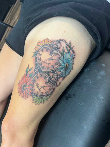 Explore thigh tattoo ideas woman, creative tattoo ideas in Nazareth, available at Nocturnal Tattoo