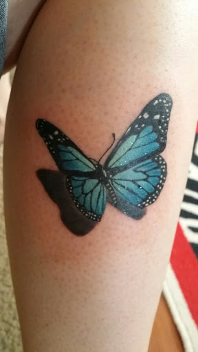 Explore red string tattoo ideas, creative tattoo ideas in Newport Beach, available at Newport Tattoo