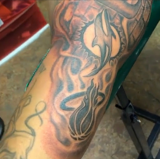 Explore cycle tattoo ideas, creative tattoo ideas in Fort Pierce, available at Xotic Empire Tattoos