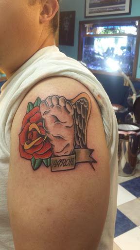 Explore half sleeve tattoo ideas, creative tattoo ideas in Buffalo, available at Madd Ink Tattoo & Piercing